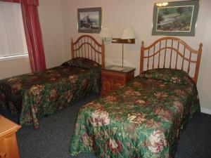 Säng eller sängar i ett rum på Unit 62 - Treeloft - 3 Bedroom VIlla