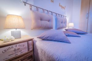 Łóżko lub łóżka w pokoju w obiekcie Casa Sant Elena ID15675