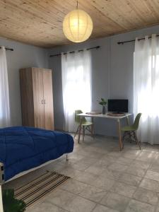 A television and/or entertainment centre at Traditional House “AVLI”