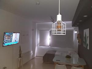 TV a/nebo společenská místnost v ubytování DPTO GENESIS