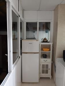 Kuchyň nebo kuchyňský kout v ubytování Pensión Antonio Guesthouse