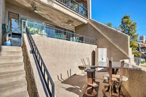 a patio with a table and chairs next to a building at 4 Mi to ASU Lake-View Tempe Condo with Pool Access in Tempe