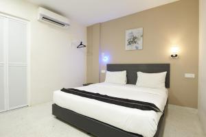 Voodi või voodid majutusasutuse M S Hotel, Tengku Kelana KTM Klang toas