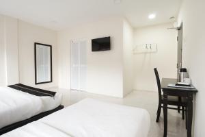 Voodi või voodid majutusasutuse M S Hotel, Tengku Kelana KTM Klang toas