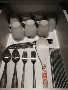a group of utensils sitting on top of a drawer at Perfect Getaway @Vivacity in Kuching