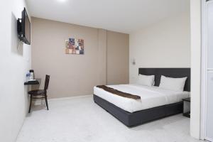 Voodi või voodid majutusasutuse M S Hotel, Tengku Kelana KTM Klang toas