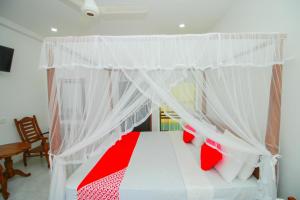 Llit o llits en una habitació de Onaro Beach View