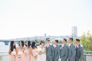 a bride and groom and their wedding party at Crowne Plaza Hotel Portland-Downtown Convention Center, an IHG Hotel in Portland