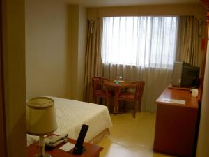 TV a/nebo společenská místnost v ubytování Busan Central Hotel