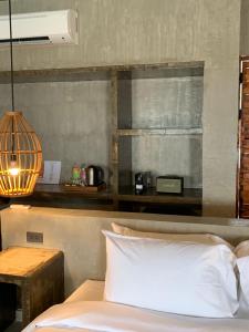 Rúm í herbergi á Cebu R Resort Tabuelan