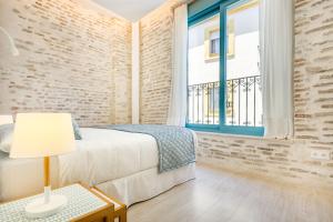 Łóżko lub łóżka w pokoju w obiekcie Espectacular casa de 6 dormitorios, 7 banos y 2 terrazas