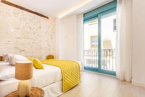 Łóżko lub łóżka w pokoju w obiekcie Espectacular casa de 6 dormitorios, 7 banos y 2 terrazas