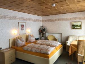 Postel nebo postele na pokoji v ubytování Haus Ingrid