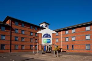 a building with a clock tower on top of it at Holiday Inn Express Droitwich Spa, an IHG Hotel in Droitwich