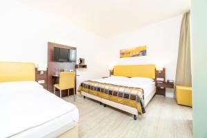 Postel nebo postele na pokoji v ubytování Hotel Rheinfelderhof
