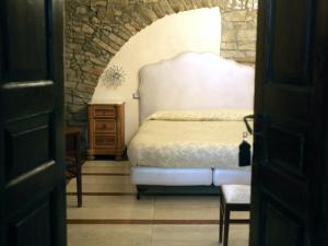 Ένα ή περισσότερα κρεβάτια σε δωμάτιο στο La Cantina del Convento +18 φωτογραφίες