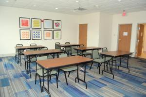 a classroom with tables and chairs in a room at Holiday Inn Express Hotel and Suites Abilene, an IHG Hotel in Abilene