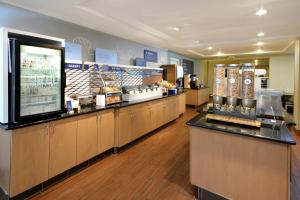 A restaurant or other place to eat at Holiday Inn Express Hotel & Suites High Point South, an IHG Hotel