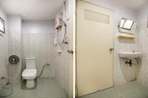 Kylpyhuone majoituspaikassa T & T Hostel Kanchanaburi