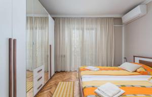 Ein Bett oder Betten in einem Zimmer der Unterkunft Apartment Complex Villa Dolce Maro Porec