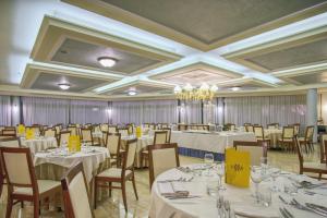 Un restaurant sau alt loc unde se poate mânca la Hotel Caesar Residence & SPA