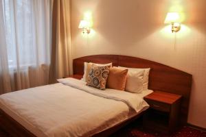 Кровать или кровати в номере Отель Звездный