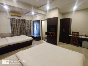Cama o camas de una habitación en Sreepathi Indraprastha