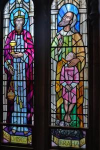 a pair of stained glass windows in a church at The Highland Club in Fort Augustus