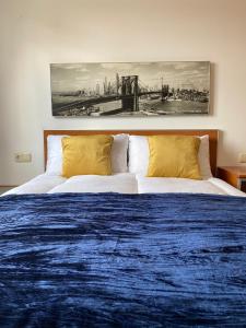 A bed or beds in a room at Apartamento LIVING Albacete Centro