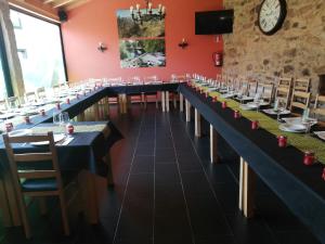 A restaurant or other place to eat at Hosteria Calixtino
