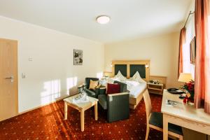 Postel nebo postele na pokoji v ubytování Wellness- und Wohlfühlhotel Waldeck