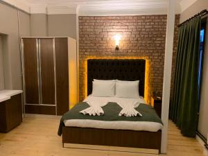 Postel nebo postele na pokoji v ubytování Berfinn Hotel Beşiktaş