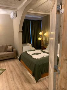 Postel nebo postele na pokoji v ubytování Berfinn Hotel Beşiktaş