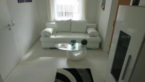 Posezení v ubytování Stadtwohnung + 8 fotografií