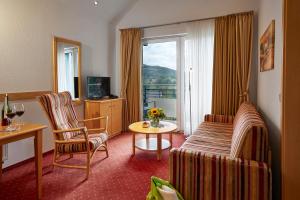 TV a/nebo společenská místnost v ubytování Hotel & Ferienappartements Edelweiss