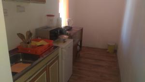 Kuchyň nebo kuchyňský kout v ubytování APARTMAN RITA