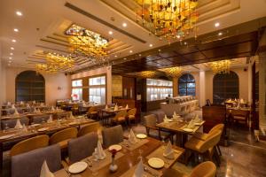 Restoran või mõni muu söögikoht majutusasutuses Hotel MBC Citadel Nashik