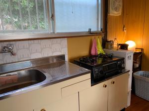 Private house Kumanoyasai BASE tesisinde mutfak veya mini mutfak