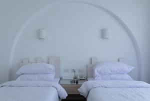 Cama o camas de una habitación en Fade Hotel by La Hacienda Ras Sudr