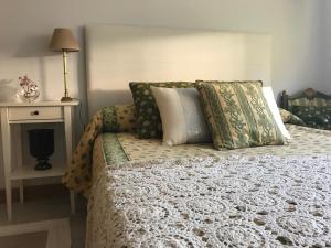 A bed or beds in a room at Varosha Combarro