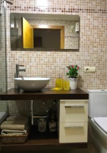 A bathroom at Varosha Combarro