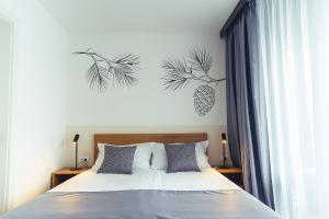 Postel nebo postele na pokoji v ubytování MORENIA All Inclusive Hotel