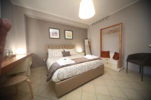 Posteľ alebo postele v izbe v ubytovaní B&B Capuam Vetere Accommodation
