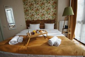 Postelja oz. postelje v sobi nastanitve Hotel Cordata
