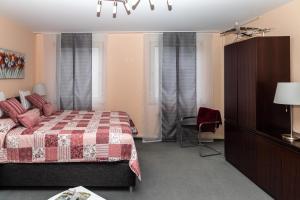 Postel nebo postele na pokoji v ubytování BIT-City Studio und Appartement