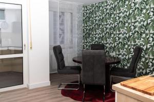 Posezení v ubytování BIT-City Studio und Appartement