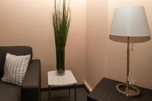 Posezení v ubytování BIT-City Studio und Appartement