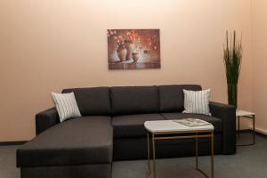Posezení v ubytování BIT-City Studio und Appartement