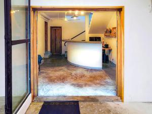 an empty room with a floor covered in water at SATRANA HOTEL TAMATAVE in Toamasina