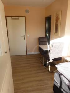 Postel nebo postele na pokoji v ubytování BIT-City Studio und Appartement